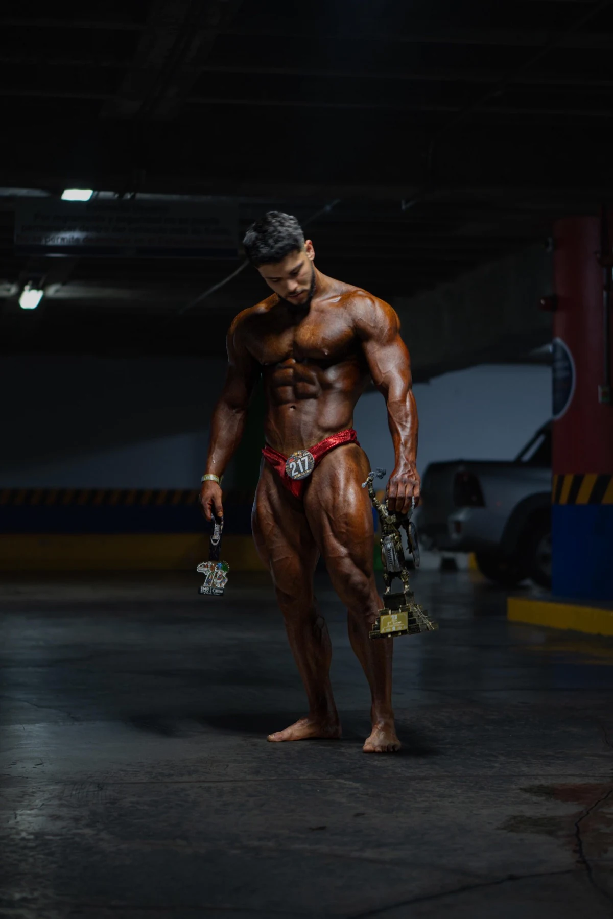 Athlete with trophies and medals after the competition